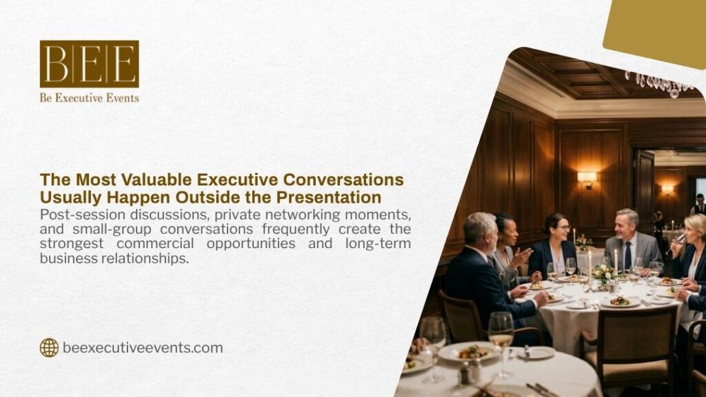Executive group engaged in meaningful conversation during dinner at elegant networking event. Be Executive Events graphic on how the most valuable executive conversations usually happen outside the presentation.